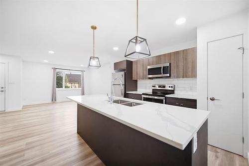 Main/basement 3 bed 2.5 bath suite - 583 Cote Street, Winnipeg, MB 