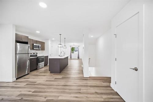 Main/basement 3 bed 2.5 bath suite - 583 Cote Street, Winnipeg, MB 