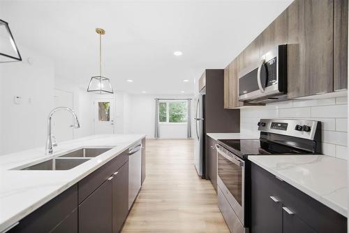 Main/basement 3 bed 2.5 bath suite - 583 Cote Street, Winnipeg, MB 