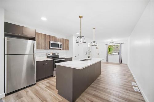 Main/basement 3 bed 2.5 bath suite - 583 Cote Street, Winnipeg, MB 