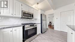 Stainless Steel Appliances & Valance Lighting - 