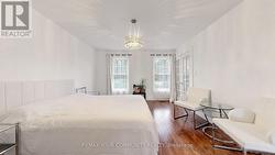 Main Floor Bedroom Overlooking Frontyard - 