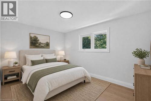 Neutral wall tones with wood-finish flooring - 3028 Eva Drive, Burlington, ON 