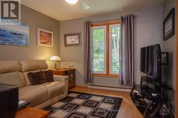 Main Floor Den/Bedroom - 