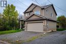 Two-story residence featuring siding and stone exterior accents - 4274 Sixth Avenue, Niagara Falls, ON 