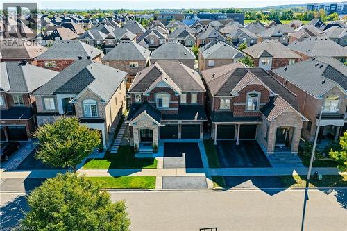 Traditional brick and stone facade with a prominent gabled roofline - 3352 Hiscott Avenue, Burlington, ON 