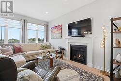 Gas fireplace & zebra blinds - 