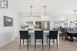 White maple Muskoka custom cabinets - 