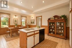 Kitchen with Dining - virtually staged - 