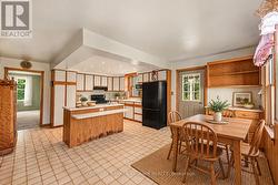 Kitchen with Dining - virtually staged - 