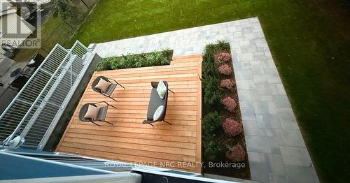 View of the backyard deck from the balcony. - 3 Peel Street, St. Catharines (Port Dalhousie), ON 