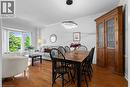 Hardwood-finish flooring, bay window, contemporary ceiling light fixture, crown molding, and a built-in wooden cabinet - 1610 Heathside Crescent, Pickering, ON 