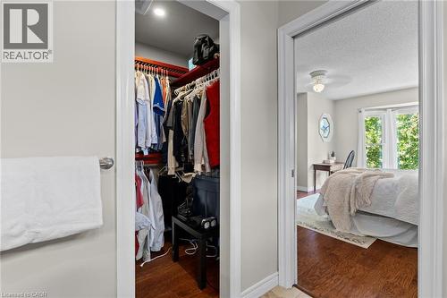 Built-in closet with recessed lighting and wood-finish shelving - 1610 Heathside Crescent, Pickering, ON 