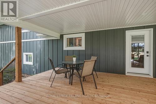 Back Deck: Expansive Covered Back Deck - 15198 St Ignatius Line, Chatham-Kent (Bothwell), ON 