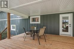 Back Deck: Expansive Covered Back Deck - 