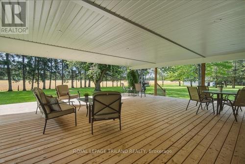 Back Deck: Expansive Covered Back Deck - 15198 St Ignatius Line, Chatham-Kent (Bothwell), ON 