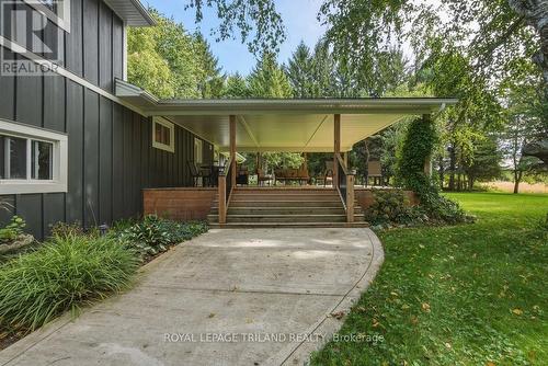 Back Deck: Stairway to Expansive Covered Deck - 15198 St Ignatius Line, Chatham-Kent (Bothwell), ON 