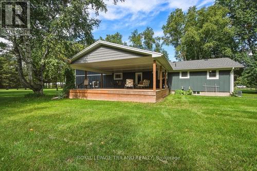 Back Deck: Expansive Covered Back Deck - 15198 St Ignatius Line, Chatham-Kent (Bothwell), ON 