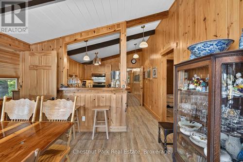 Dining Room to Kitchen with Breakfast Bar - 1048 Nora Lane, Gravenhurst (Ryde), ON 