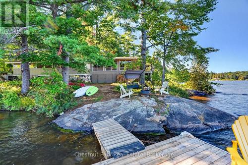 Outside Offers a Peaceful Sitting Area & Fire Pit - 1048 Nora Lane, Gravenhurst (Ryde), ON 