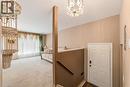 Spacious entrance off the driveway with closet and stairs to main level - 450 Brigadoon Drive, Hamilton, ON 
