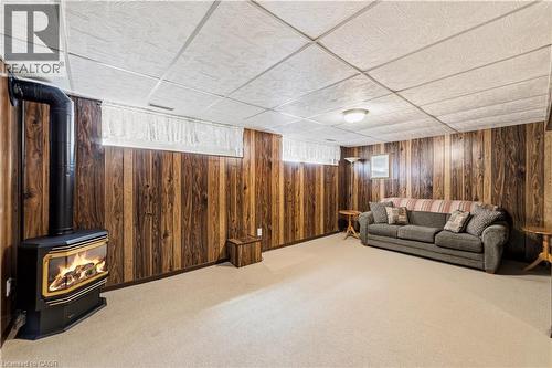 Gas fireplace, ample lighting from long windows - 450 Brigadoon Drive, Hamilton, ON 