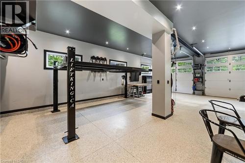 Car lift is included, oversized doors fits most RV's and trailers, great storage space for small business owners - 515 Hamilton Drive, Ancaster, ON 