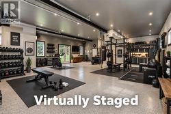 Virtually staged - transform the heated garage floor to a work out area - 