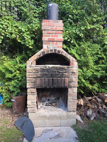 Outdoor Fireplace with Pizza Oven - 74399 Cardinal Court, Bluewater (Stanley), ON 