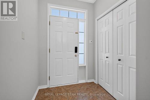 Front entrance with inside access to the garage - 2136 Bergamot Circle, Ottawa, ON 