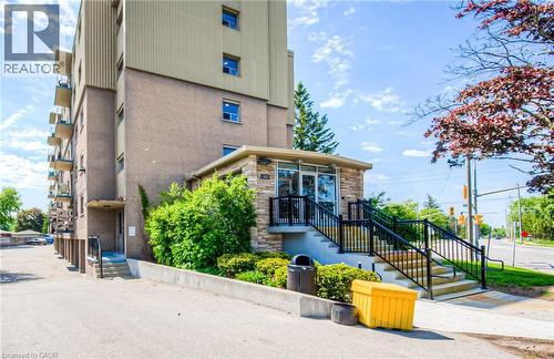 View of building exterior with stairs - 283 Fairway Road N Unit# 501, Kitchener, ON 