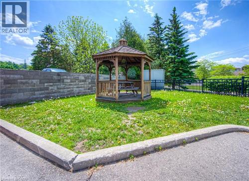 Fenced backyard with a gazebo - 283 Fairway Road N Unit# 501, Kitchener, ON 