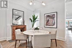 Elegant dining room with marble fireplace - 