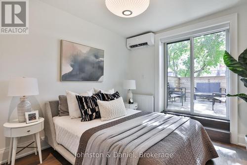 Bedroom #2 with walk-out to deck - 69 Sullivan Street, Toronto, ON 
