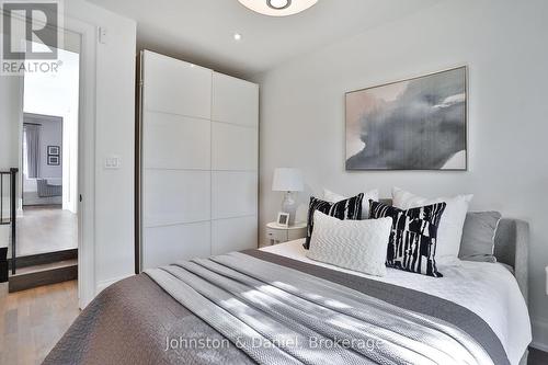 Integrated modern double closet - 69 Sullivan Street, Toronto, ON 