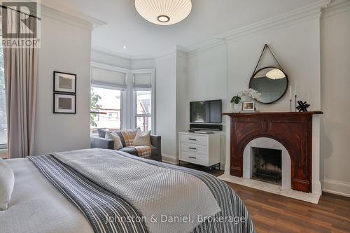 Bedroom #3 fireplace and bay window seating area - 69 Sullivan Street, Toronto, ON 