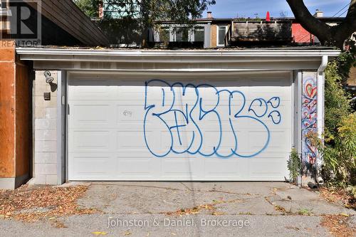 Sliding doors fully open to private garden - 69 Sullivan Street, Toronto, ON 