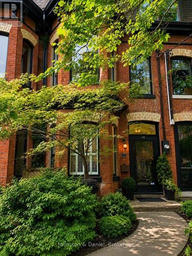 Striking red brick Victorian w/ polychrome facade - 69 Sullivan Street, Toronto, ON 