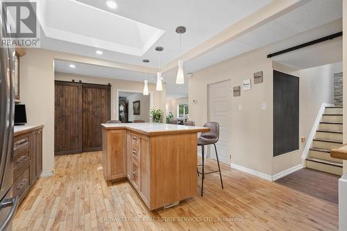 Distinctive Birch Hardwood Flooring in Kitchen - 46 Germorda Drive, Oakville, ON 