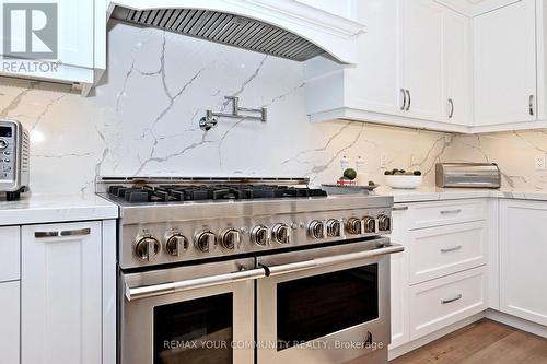 Jennair 6 burner stove/ griddle and Pot Filler - 1530 Canada Court, Oakville, ON 