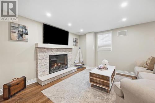 Large Recreation Room with an Electric Fireplace - 340 Oakridge Court, Oakville, ON 