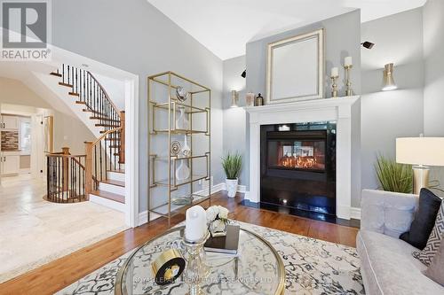 The Formal Living Room Features a Gas Fireplace - 340 Oakridge Court, Oakville, ON 