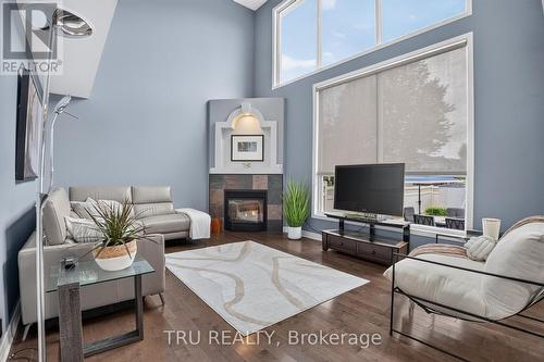 Family Room with Gas Fireplace - 57 Golflinks Drive, Ottawa, ON 