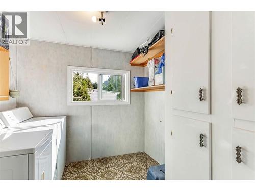 Laundry Room with additional storage - 1699 Ross Road Unit# 213, West Kelowna, BC 