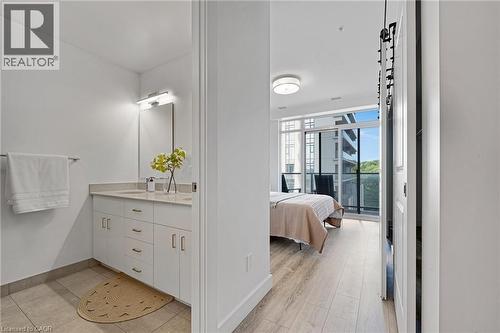 Ensuite bathroom with double vanity and floor to ceiling windows - 50 Grand Avenue S Unit# 801, Cambridge, ON 