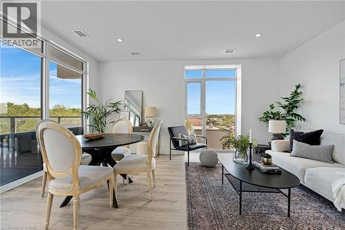 Dining room featuring light wood-style floors and recessed lighting - 50 Grand Avenue S Unit# 801, Cambridge, ON 