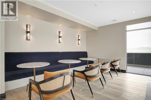 Dining area featuring light wood-style floors and recessed lighting - 50 Grand Avenue S Unit# 801, Cambridge, ON 