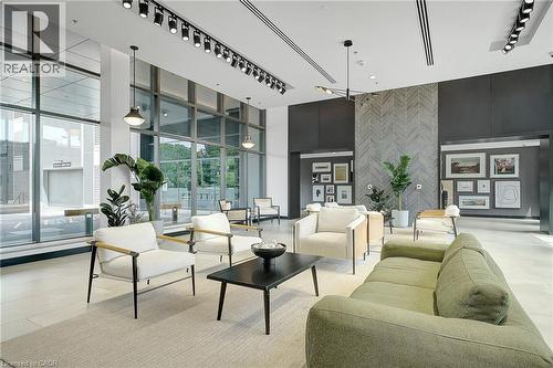 Lobby featuring expansive windows and a towering ceiling - 50 Grand Avenue S Unit# 801, Cambridge, ON 