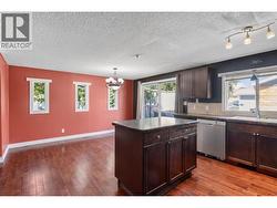 The kitchen has been virtually decluttered for presentation purposes. - 