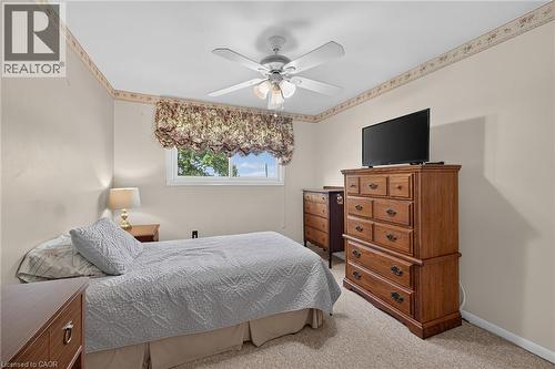 Wall-to-wall carpeting with light-toned walls and a window - 799 Highway 6, Caledonia, ON 